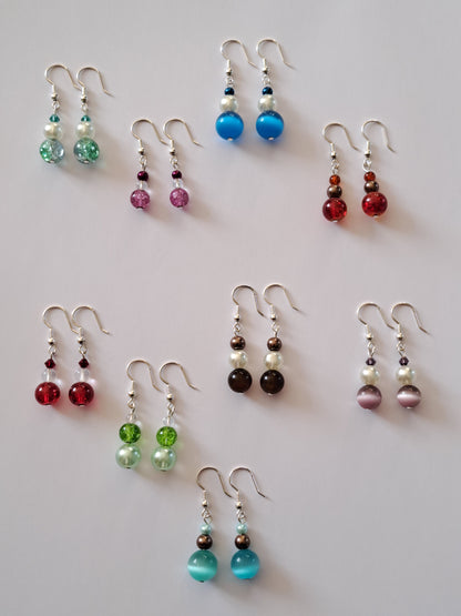 Boucles d'oreilles en argent avec perles. Site de bijoux en ligne. France