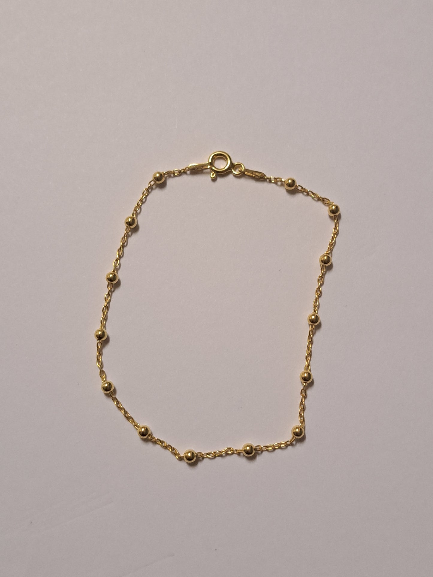 Bracelet perlé en argent doré à l'or 24k. Site de bijoux. France
