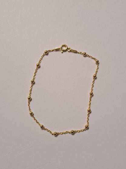 Bracelet perlé en argent doré à l'or 24k. Site de bijoux. France
