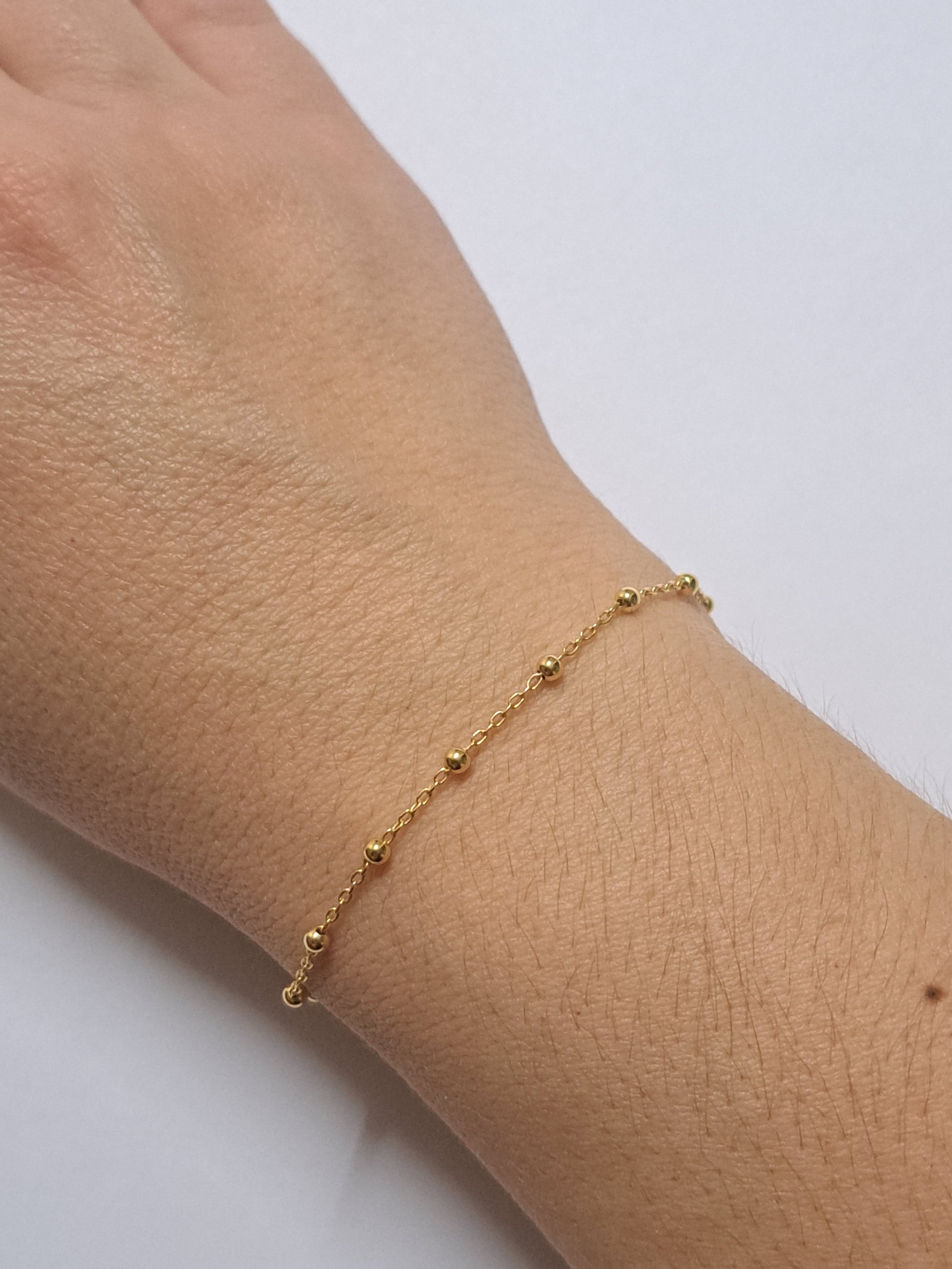 Bracelet perlé en argent doré à l'or 24k. Site de bijoux. France